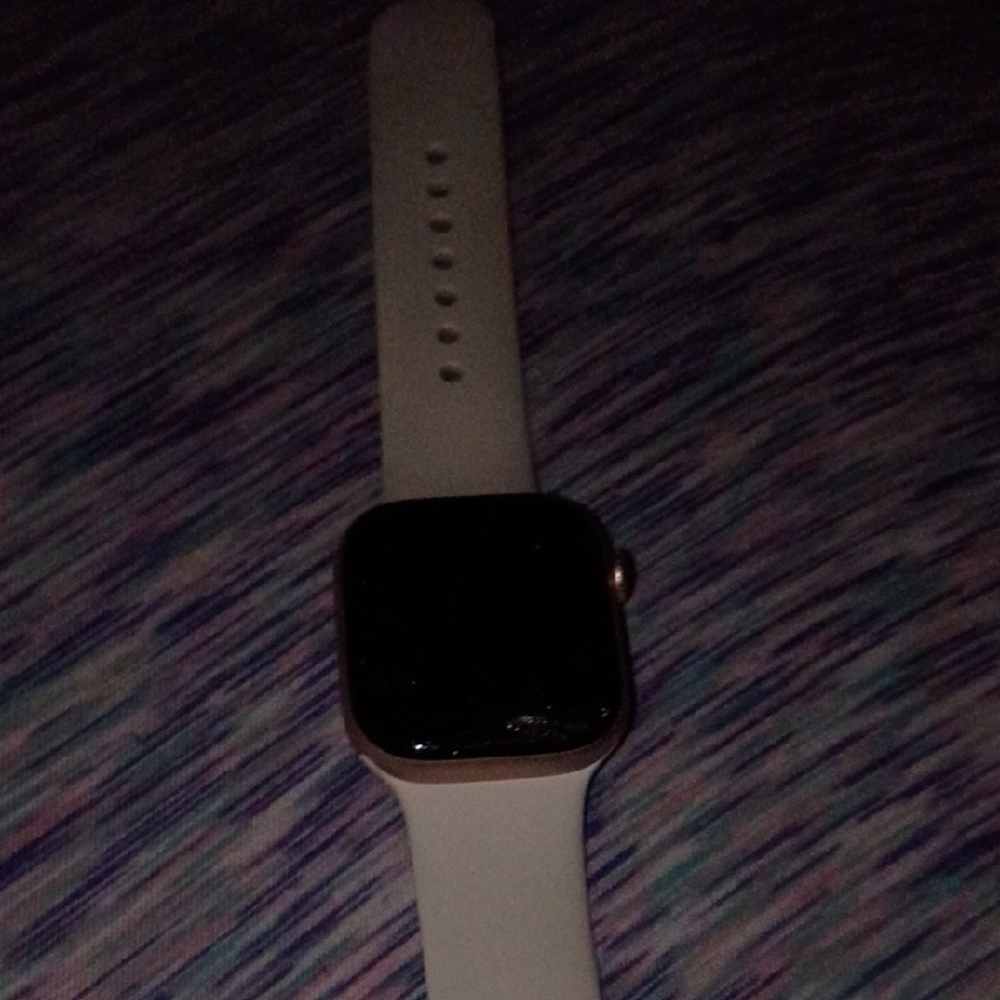 Apple Smartwatch with Gold Case and White Band